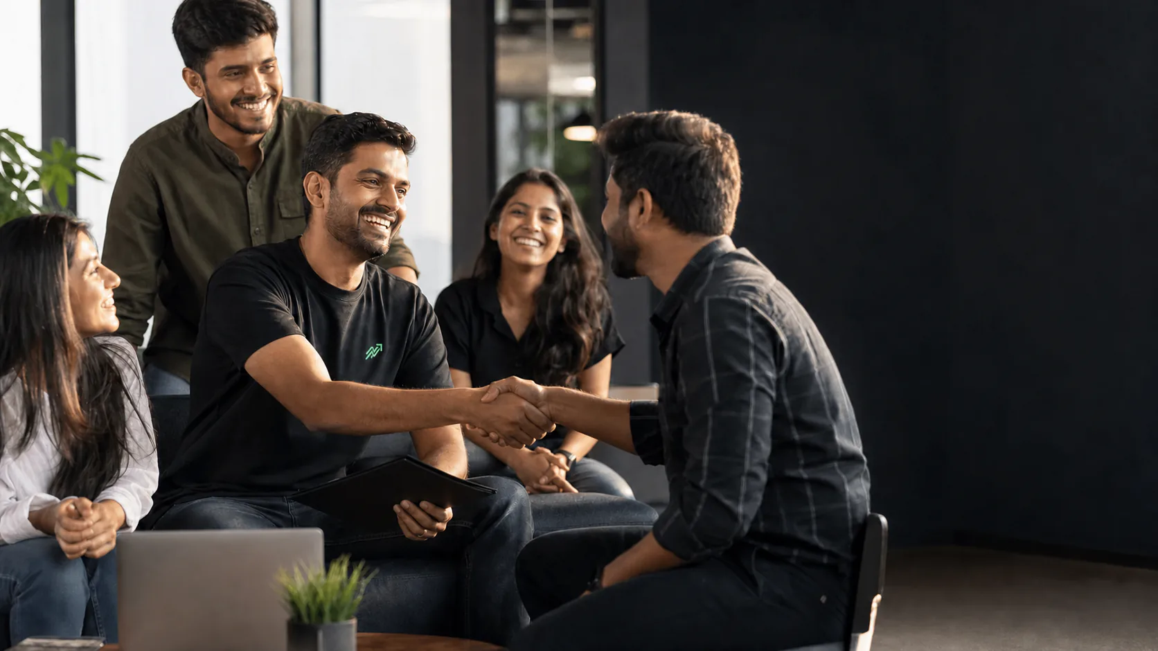 Team welcoming a successful new hire